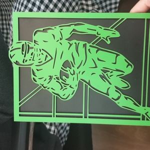 Wooden painting of a rugby player